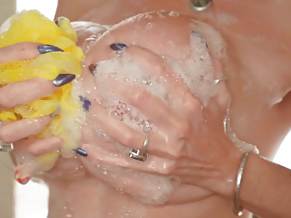 Kat Marie takes the shower and shows off her big boobs